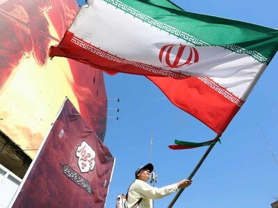 mujer-bandera-iran-efe-4732487d106cfd5c1aafaf70e59b7e3c2047b7e3w-f2a8de72-focus-min0.02-min0.72-400-300